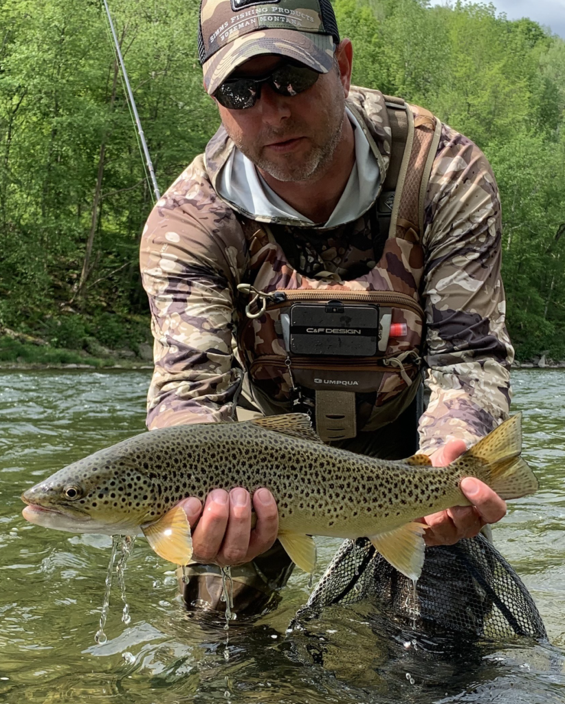 Chris Ghallagher with a brown trout