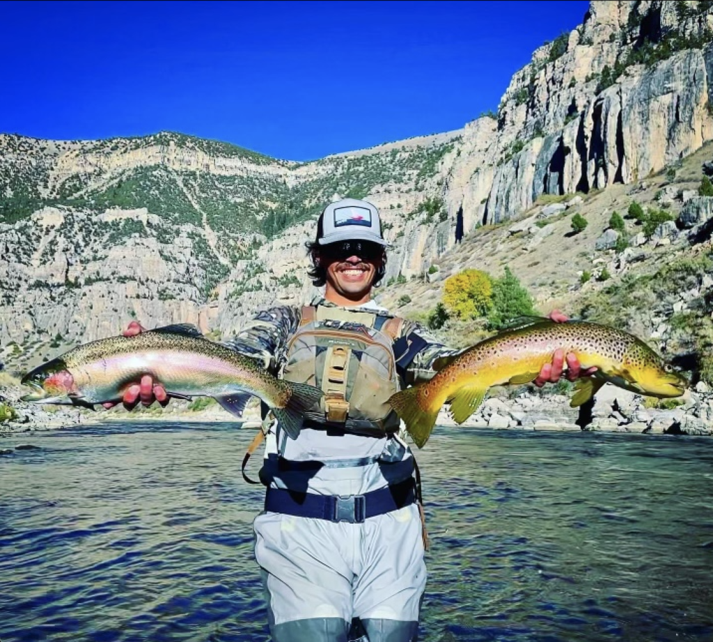 Cody Burgdorff with a brown and rainbow trout