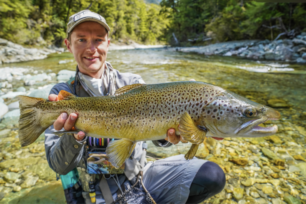 Devin Olsen with a new Zealand Brown trout
