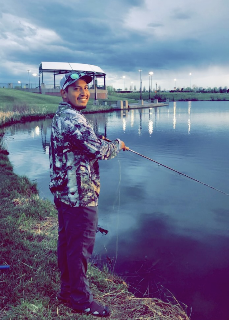 Laramie Smith fishing a lake