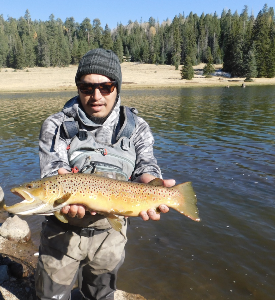 Laramie Smith with a brown trout
