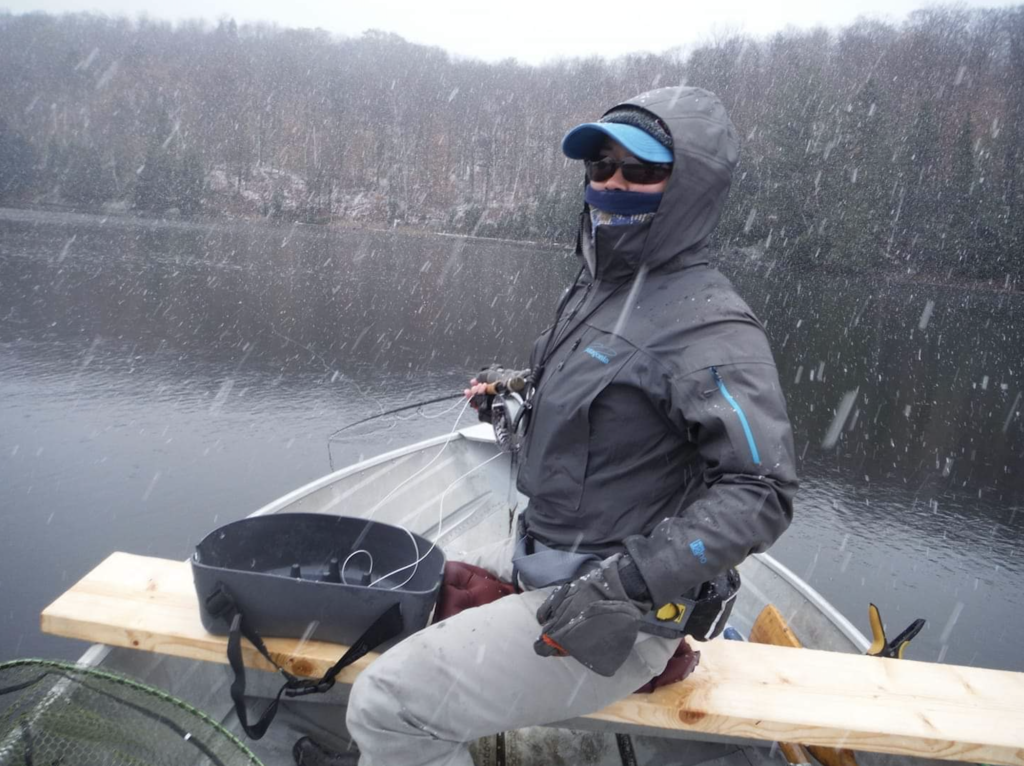 Madoka Myers fishing a lake