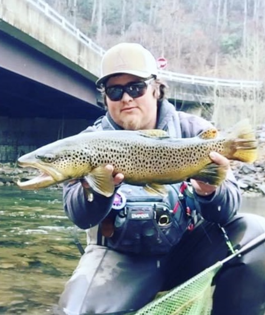 Michael Bradley with a brown trout